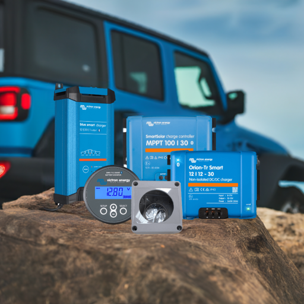 victron energy charging kit sitting on stone with a 4x4 in the background